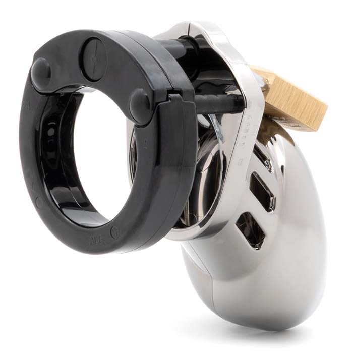 Back and side view, with tip angled to the left of a fully-assembled chrome finish and black CB-6000s penis chastity cage. Three black locking pins connect the black base ring to the chrome finish penis cage and a brass padlock is seen hanging from the center locking pin.